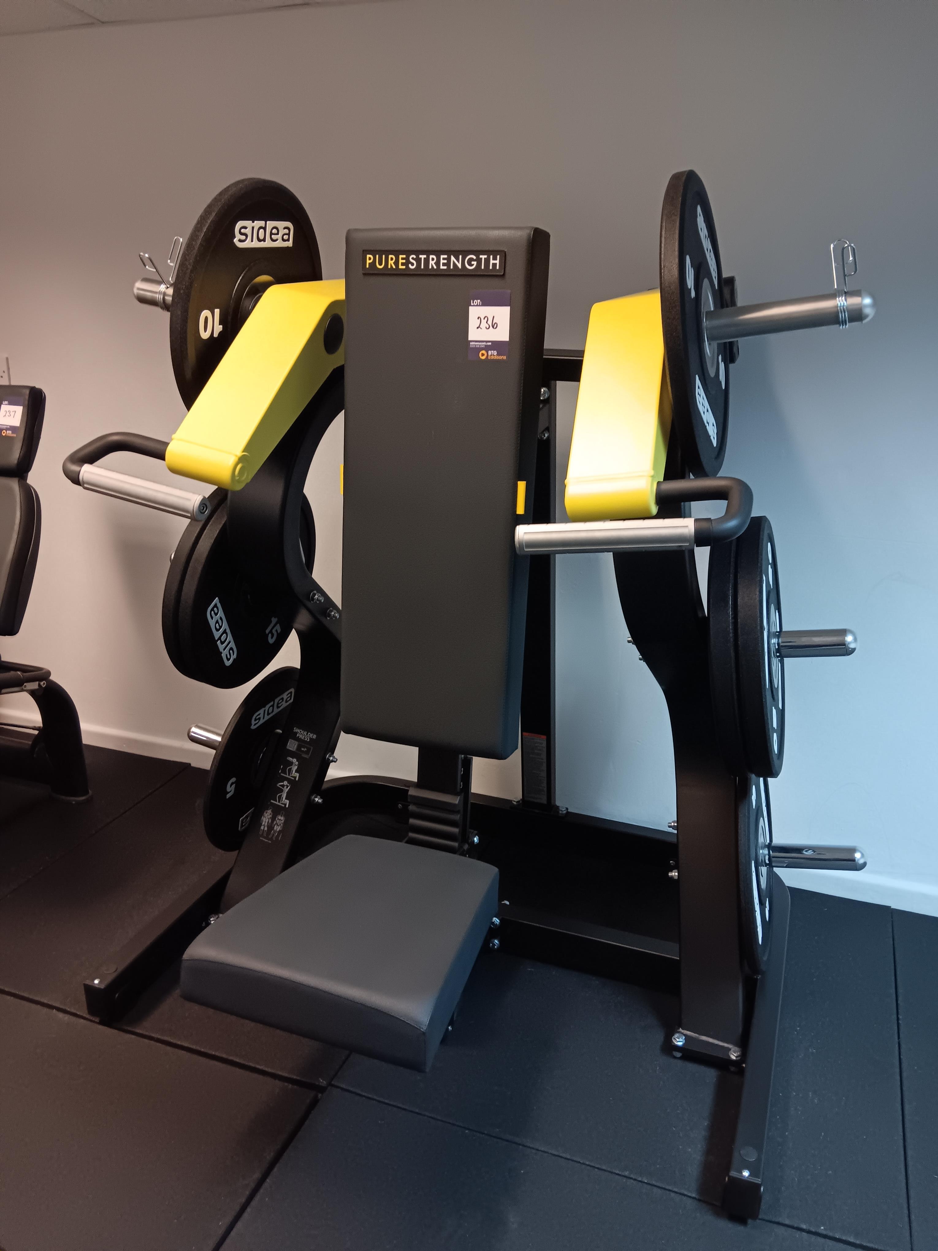 Technogym pure strength shoulder press to include : 2x 5kg rubber bumber plates, 2x 10kg rubber - photo 1