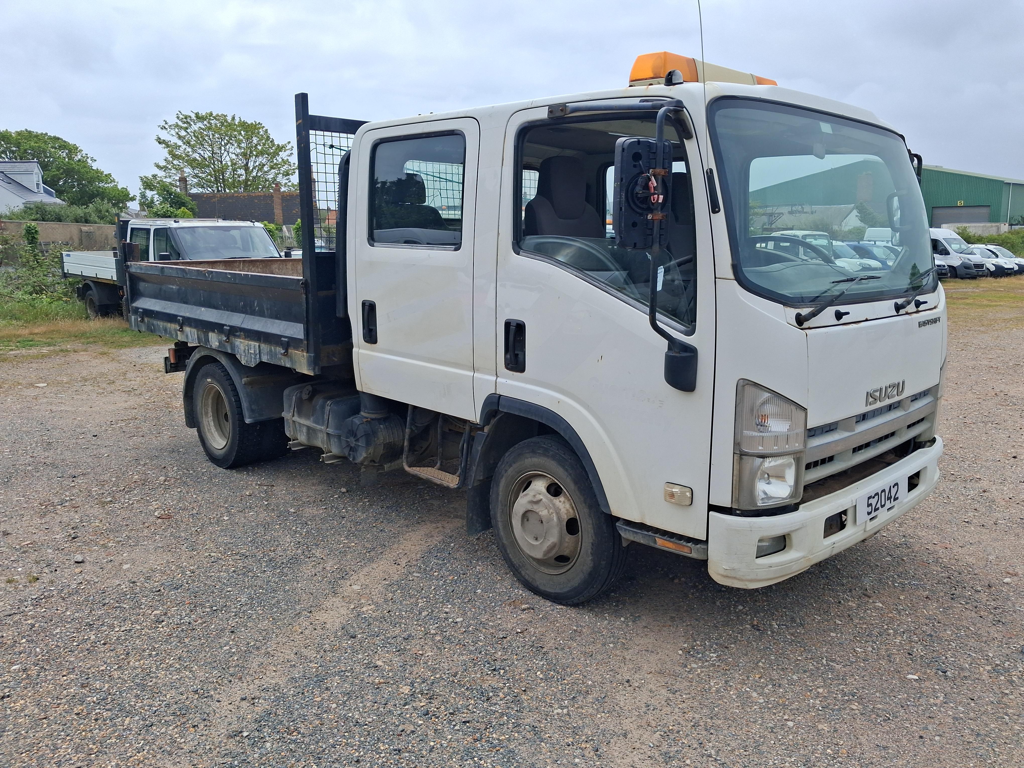 Isuzu NPR-7 Dropside Flatbed Truck - photo 1