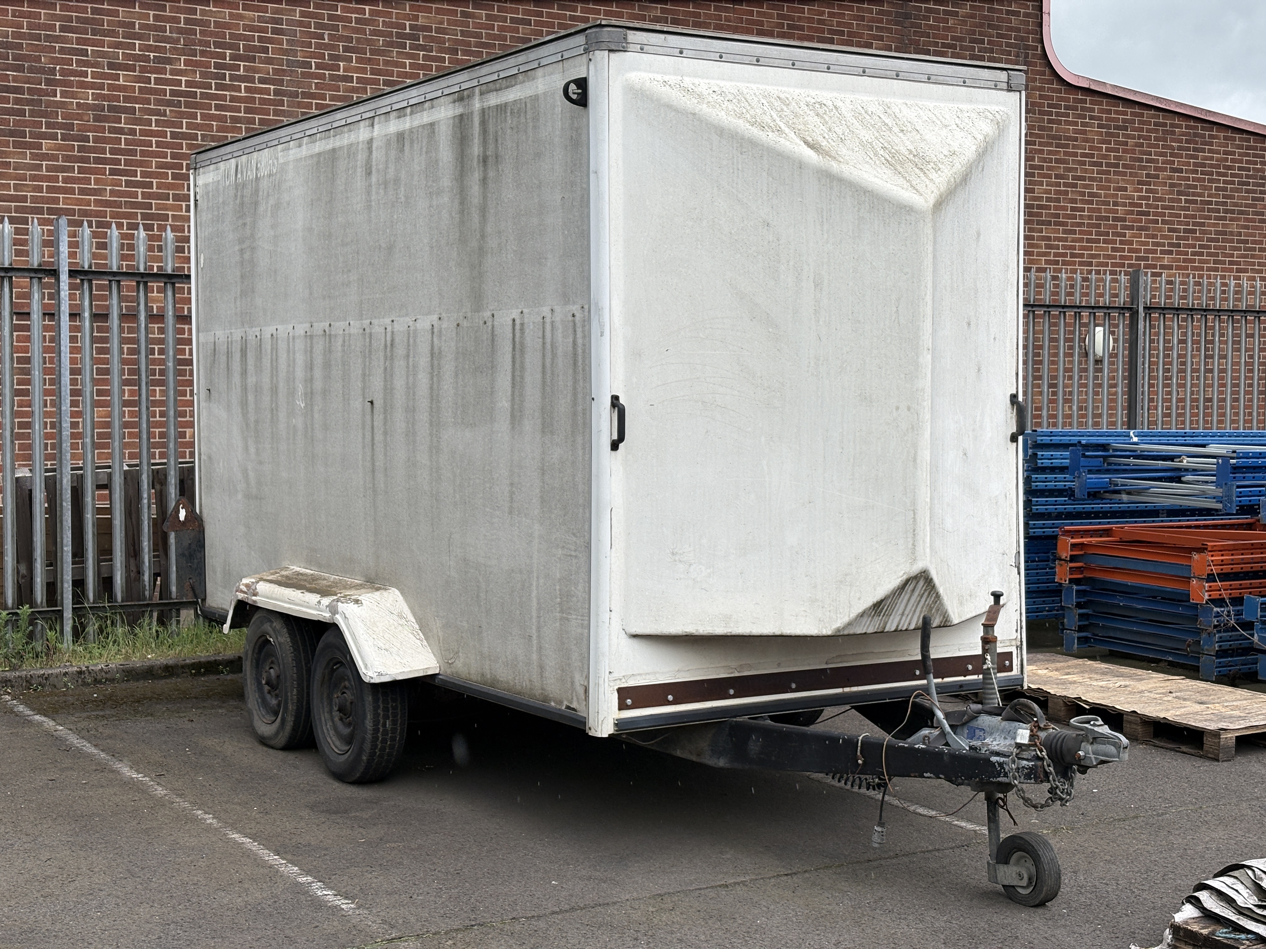 Twin axle box trailer with rear roller door. This lot is buyer to remove. - photo 1