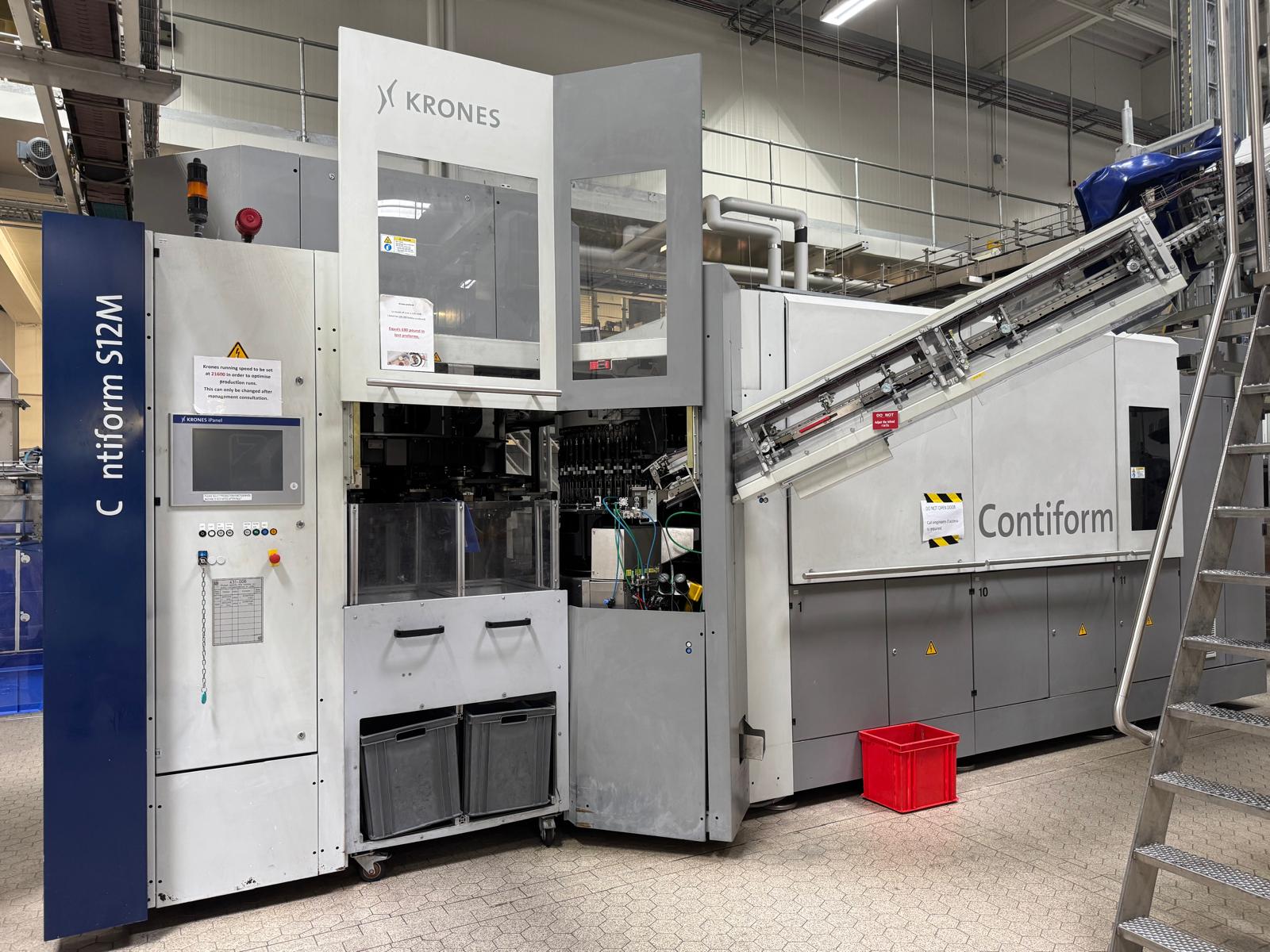 This is a Composite lot made up of Lots 1-4, Lot 1- Krones Type S12M Bottle Blow Moulder for pre-for - photo 1