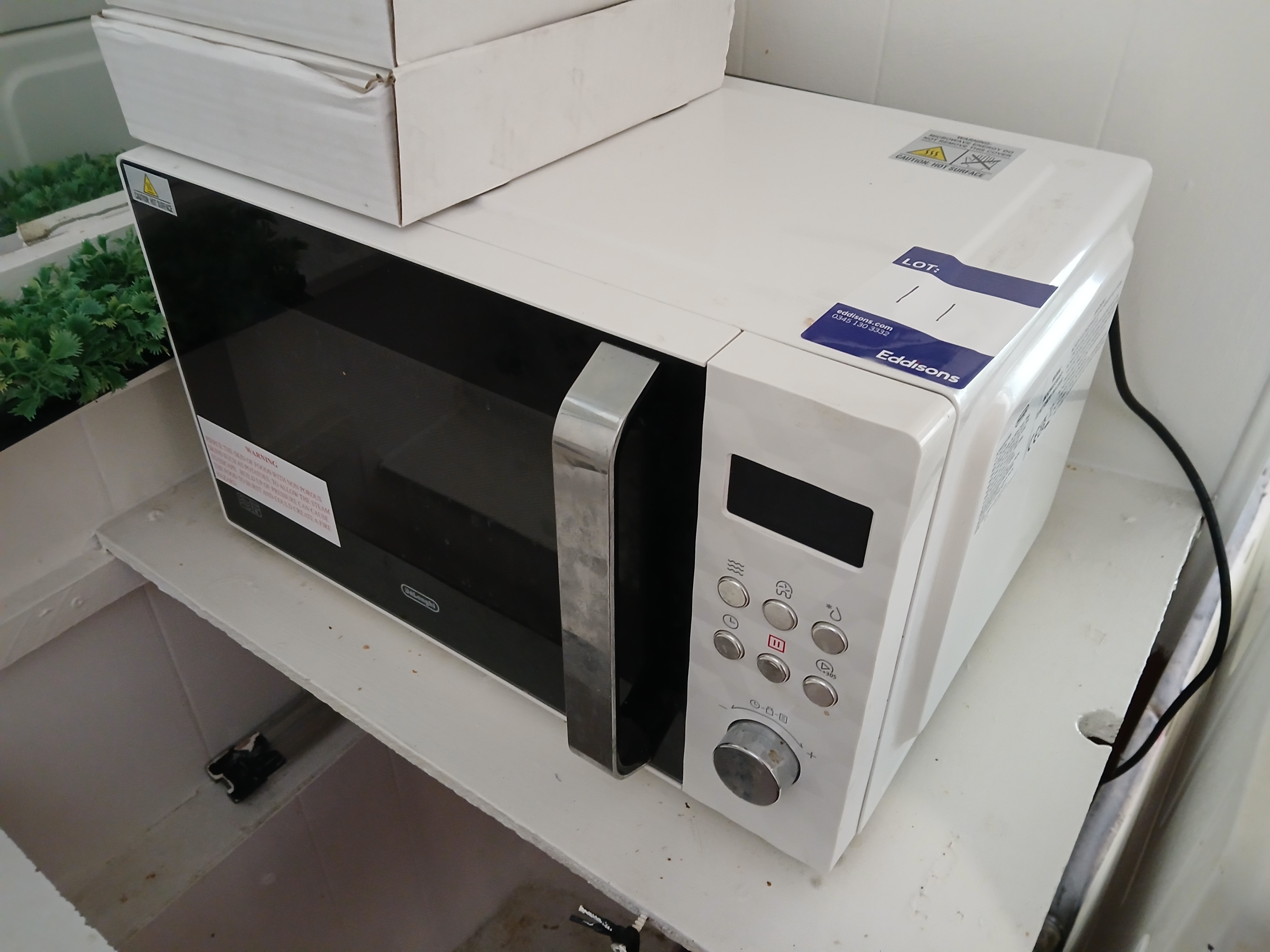 Delonghi Microwave (sold subject to vendors acceptance of winning bid) - photo 1