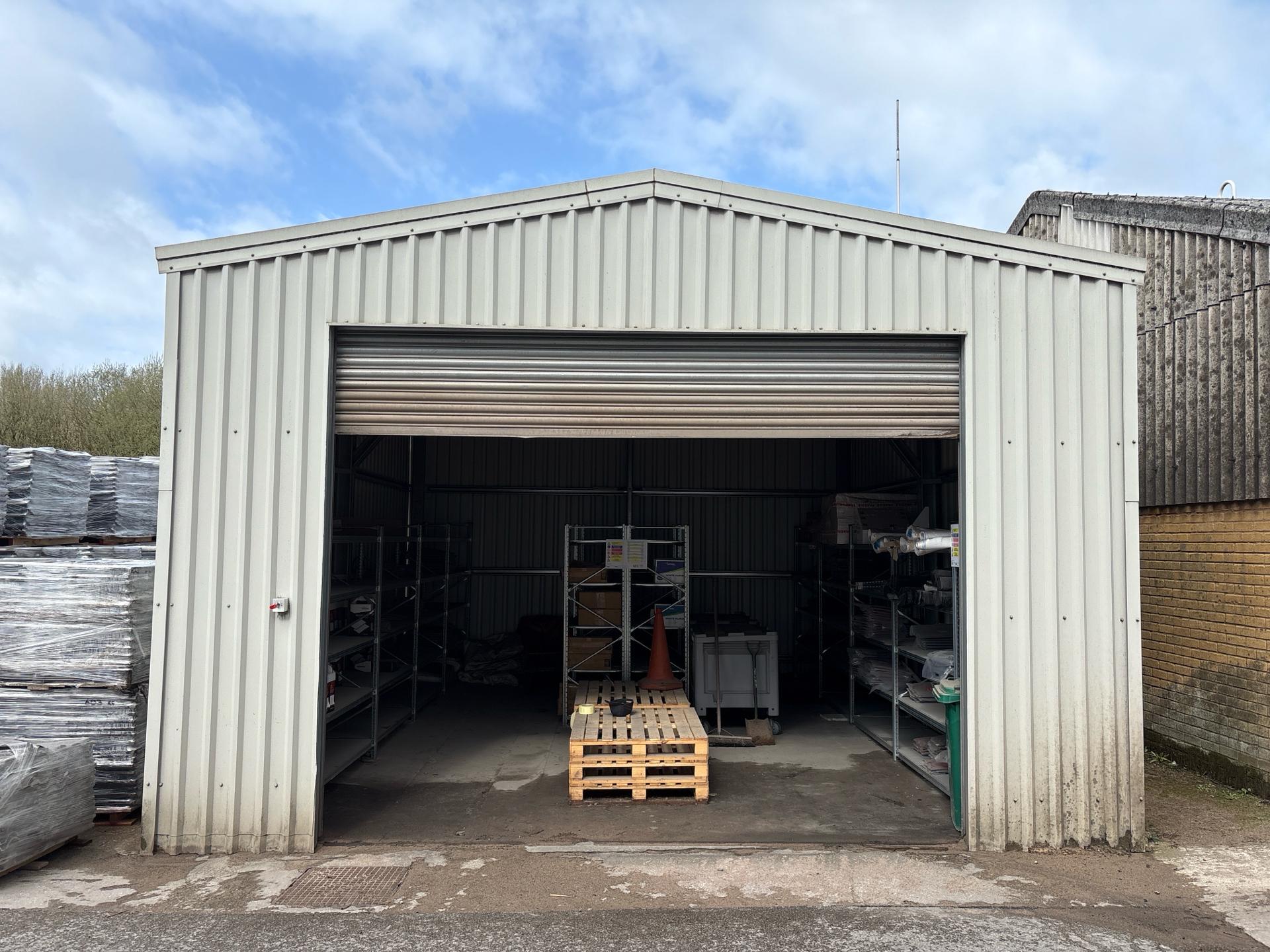 Metal Shed with Roller Shutter - photo 1