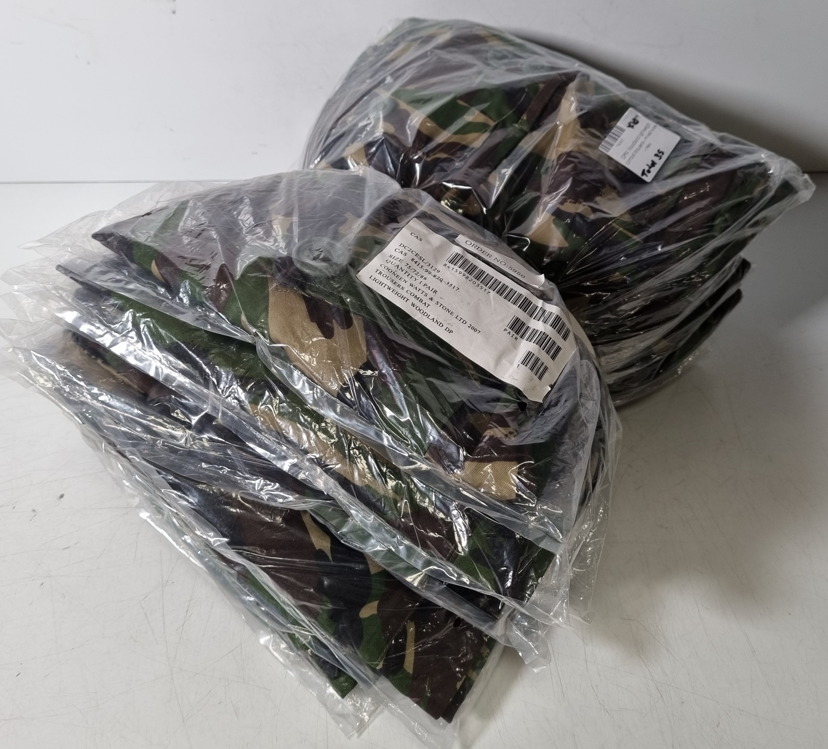 14x DPM woodland lightweight combat jackets, 35x DPM Woodland lightweight combat trousers — photo 1