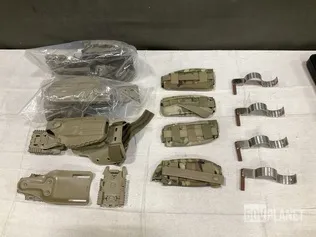 (10) Safariland Holsters, (118) Tourniquet Pouches & Assorted Items