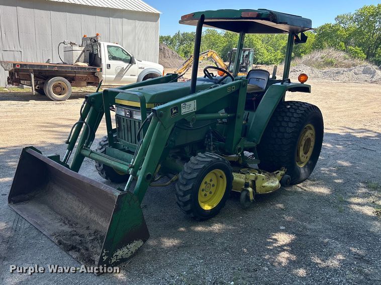 1990 John Deere 1070 MFWD Tractor - photo 1