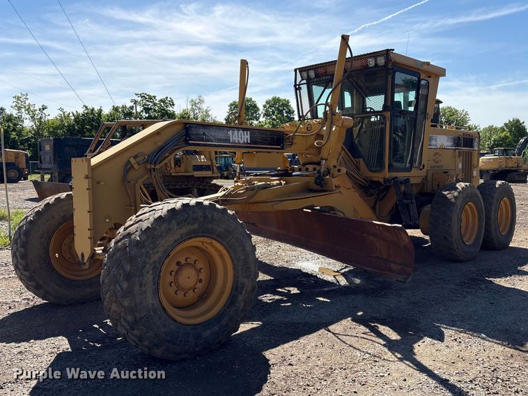 1999 Caterpillar 140H Motor Grader - photo 1