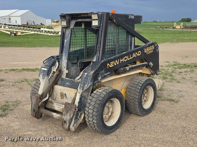 1999 New Holland LX665 Skid Steer Loader - photo 1