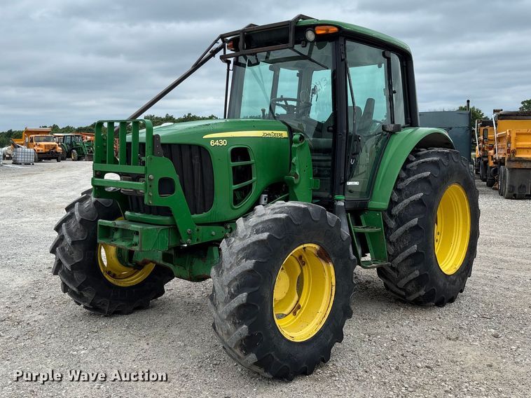 2009 John Deere 6430 MFWD Tractor - photo 1