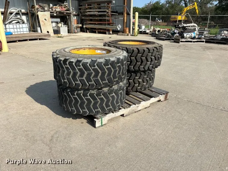 (4) 12-16.5 Tires And Wheels