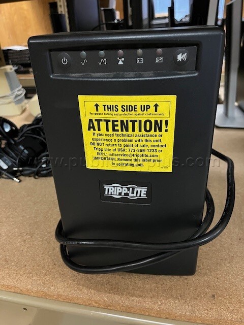Tripp-Lite Uninterruptible Power Supply — photo 1