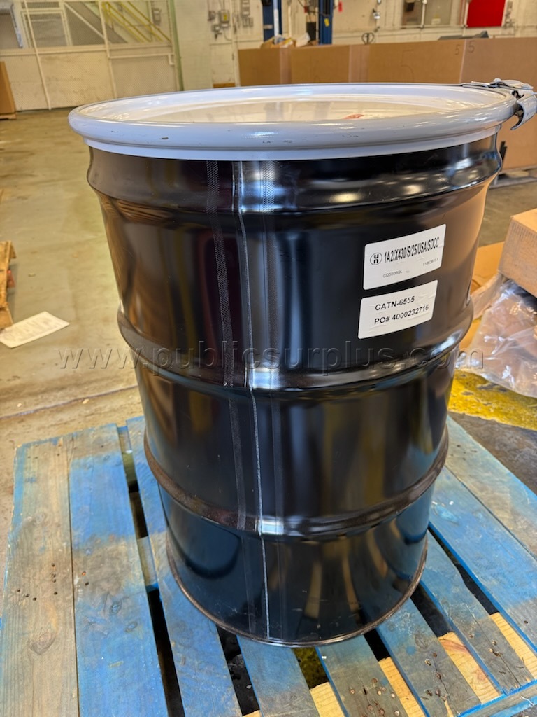 Drum with assorted tools — photo 1