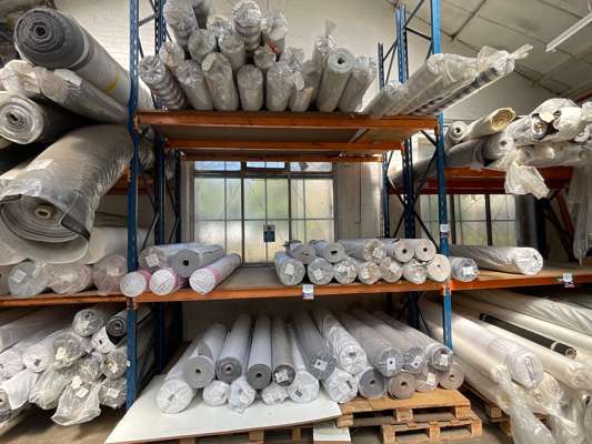 Approx 60 Rolls Various Fabric in Bay of Racking