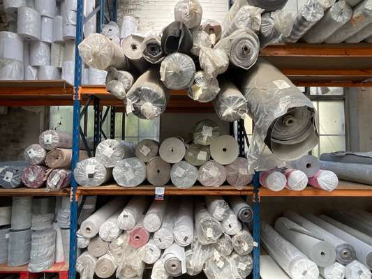 Approx 55 Rolls Various Fabric in Bay of Racking