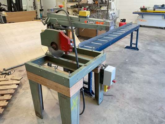 DeWalt Radial Arm Crosscut Saw with Roller Conveyor