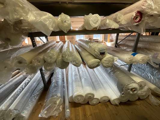 Approx 48 Rolls Various Fabric in Bay of Racking - photo 1