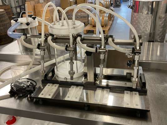 ENOL Master 4-Head Electric Vacuum Bottle Filling Line 240v — photo 1