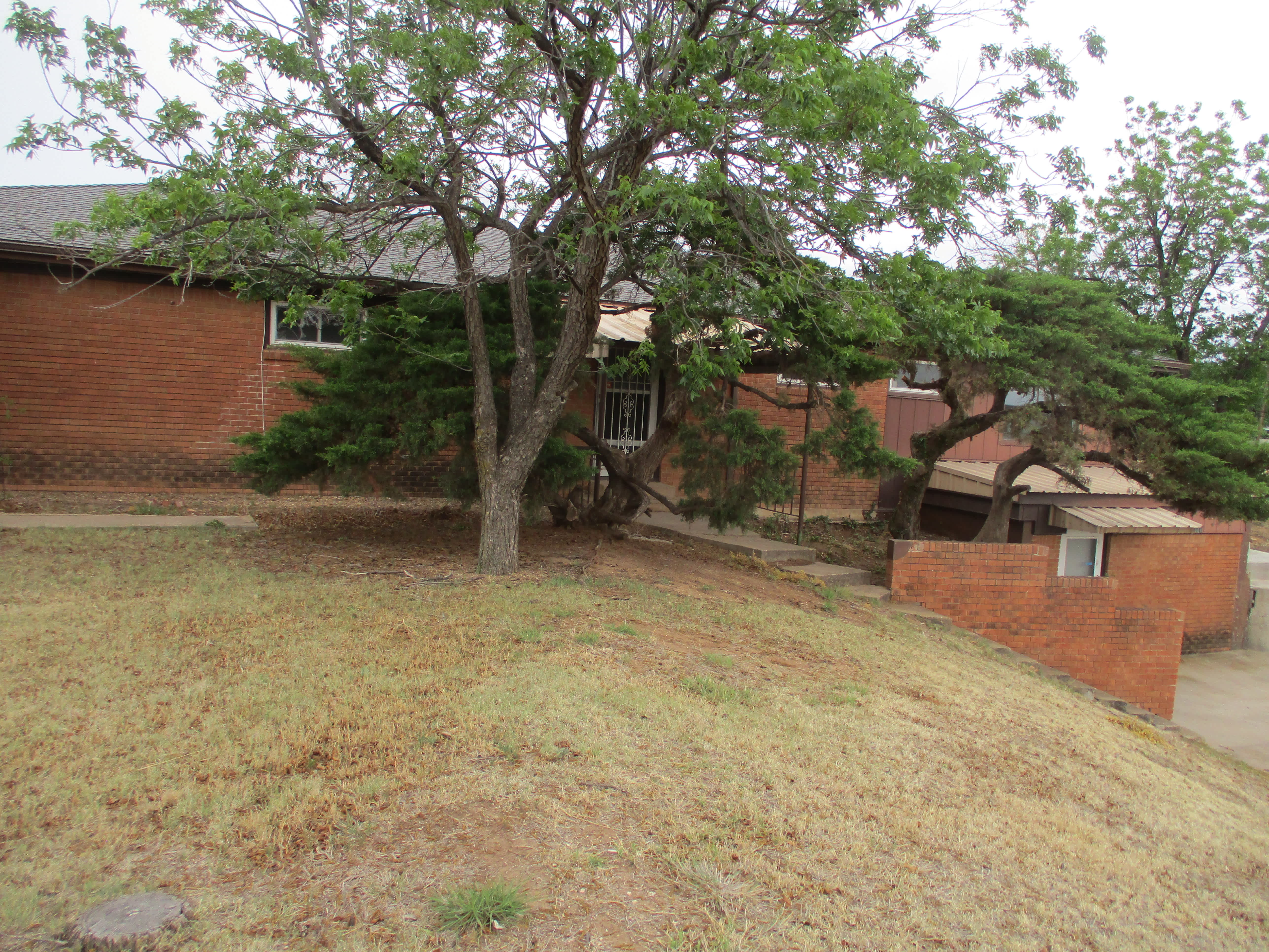 HUD Home — 1200 E Harvester Ave, Pampa, TX 79065