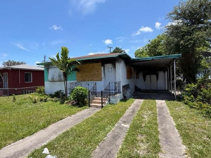 HUD Home — 1810 Nw 55th St, Miami, FL 33142 - photo 1