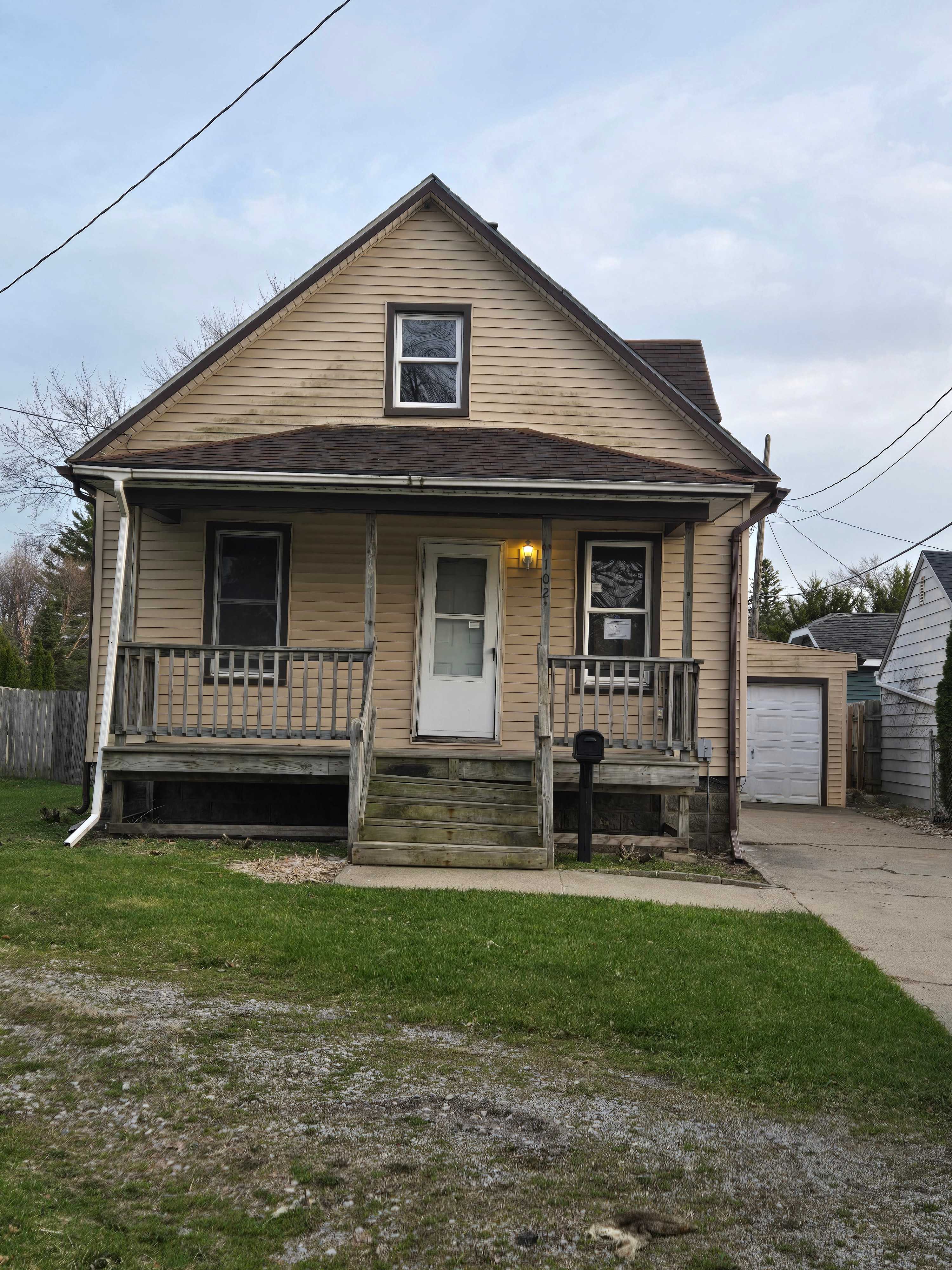 HUD Home — 102 Nebobish Ave, Essexville, MI 48732 — photo 1