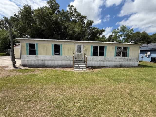 HUD Home — 1935 Fruitland Park Circle, Eagle Lake, FL 33839 — photo 1
