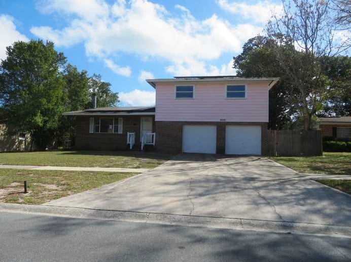 HUD Home — 5932 Jaguar Dr W, Jacksonville, FL 32244 — photo 1