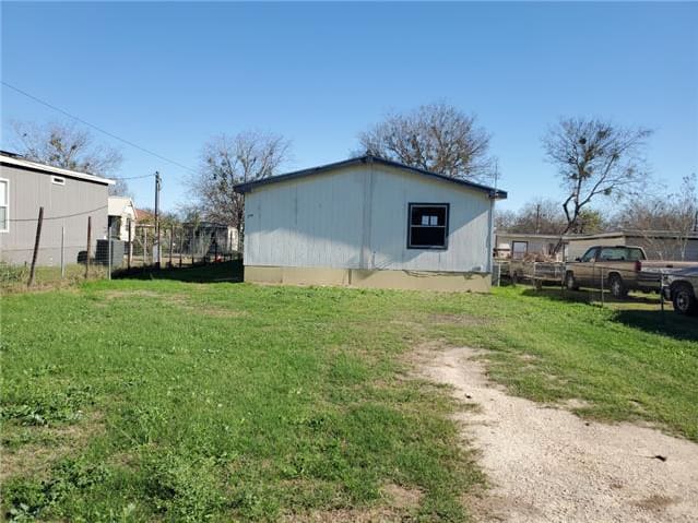 HUD Home — 754 Kayroe Rd, Adkins, TX 78101 — photo 1