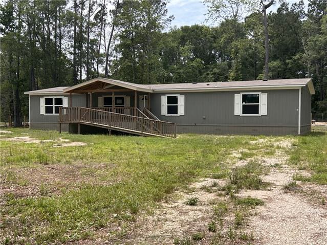 HUD Home — 534 County Road 3891 S, Cleveland, TX 77328 — photo 1