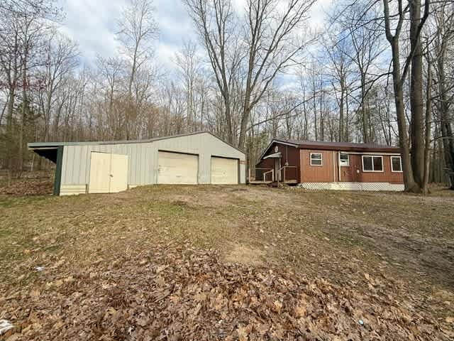 HUD Home — 4933 E Johnson Rd, Lake City, MI 49651 - photo 1
