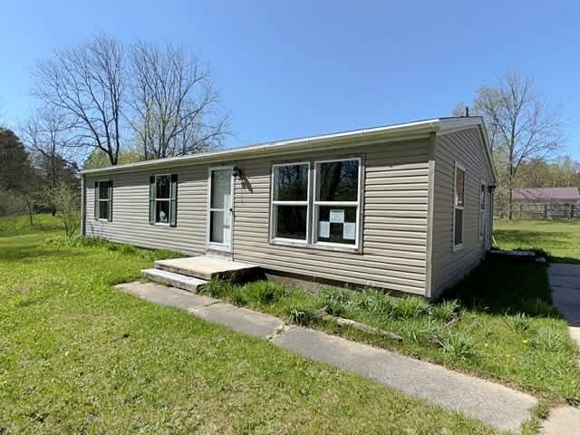HUD Home — 20956 Fewins Road, Interlochen, MI 49643 - photo 1