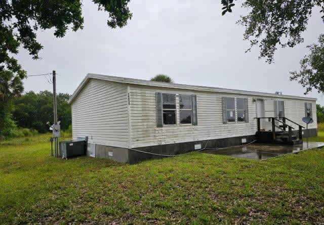 HUD Home — 14455 Nw 284th St, Okeechobee, FL 34972 — photo 1