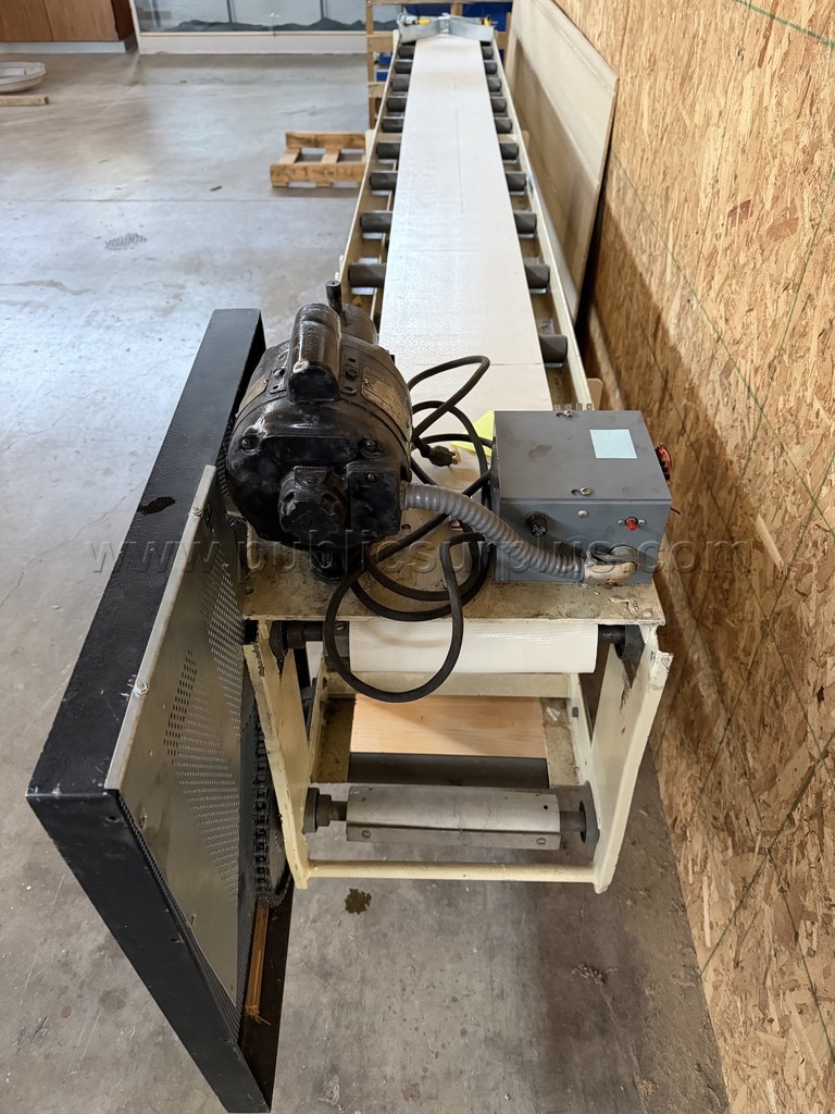a motorized industrial belt conveyor system with a flat conveying surface - photo 5