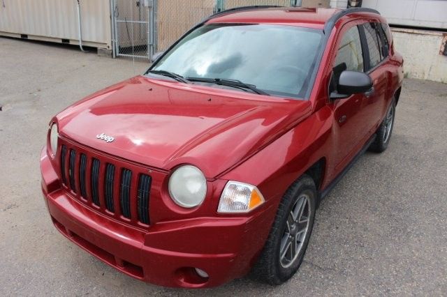2009 Jeep Compass VIN:1J4FF47B59D190868 (P)