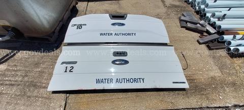 2 Ford F-150 XL tailgates and 2 diamond plate aluminum side mount toolboxes