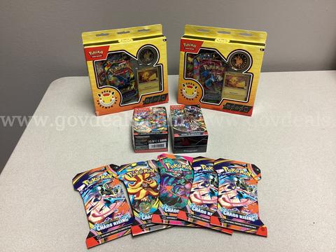 Pokémon mega evolution booster pack, pitch black booster bundle, 2 Pokémon collection boxes, 5 sleeved booster packs