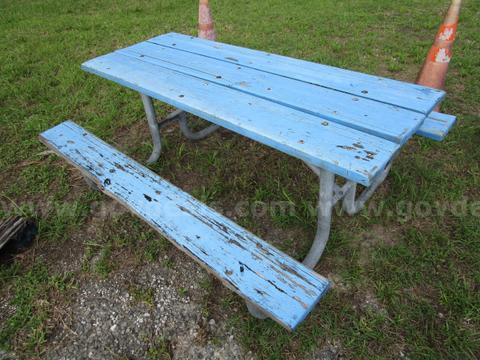 (1) USED PICNIC TABLE W/ METAL FRAME AND BLUE WOOD BOARDS
