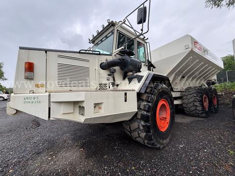 Stoltz 27-Ton Articulated Truck Spreader Mounted on 2002 Volvo A30C Articulated Dump Truck