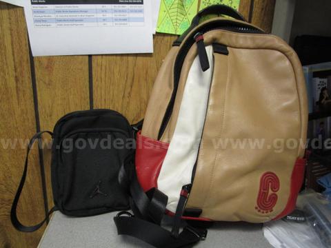 (1) USED DESIGNER BACKPACK; (1) USED SMALL SHOULDER BAG
