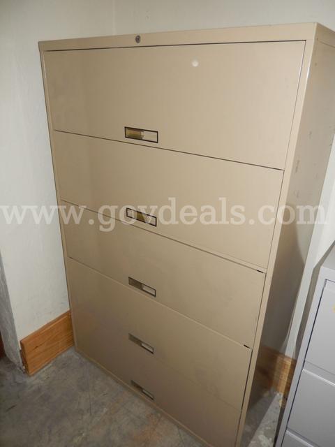 USED (1) TAN METAL, 5-LATCH DOOR, LATERAL 65" H x 18" W x 42" L