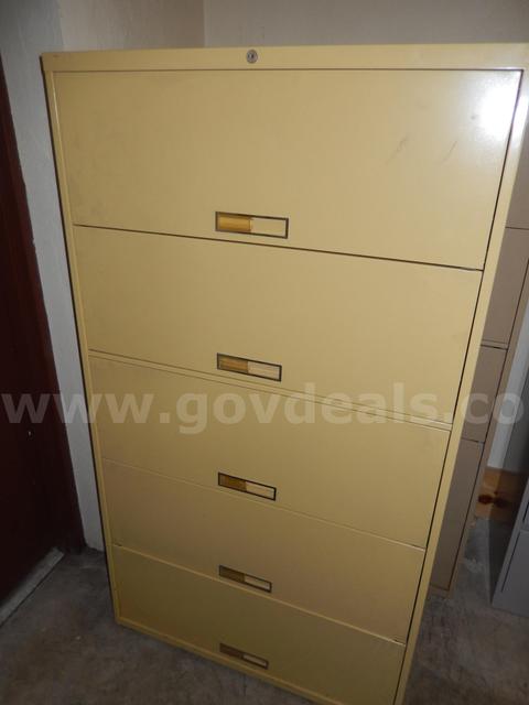 USED (1) YELLOWISH TAN, 5-LATCH DOOR, LATERAL 65" H x 18" W x 36" L