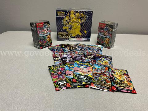 Pokémon Scarlet & Violet Surging Sparks Elite trainer Box,(2) Chaos rising booster pack,( 15 )assorted boosters pack