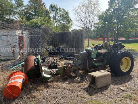 John Deere tractor and John Deere Bunker Rake - both missing parts