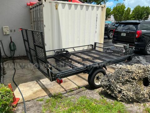 utility trailer designed for hauling ATVs or golf carts