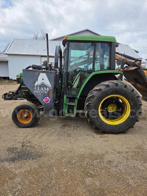 John Deere 6300 with Boom Mower