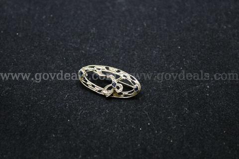 1- Silver Colored Brooch With Multiple Colored Stones