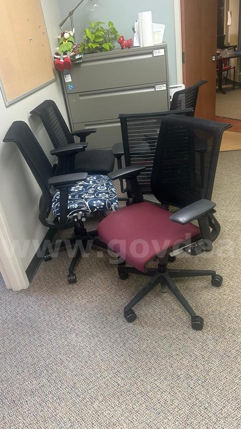 Five office chairs