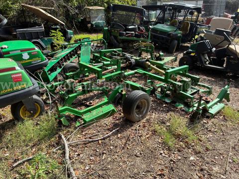 Lot of 2 4-deck mower attachments, 60" Kubota mower deck, and scrap core harvester