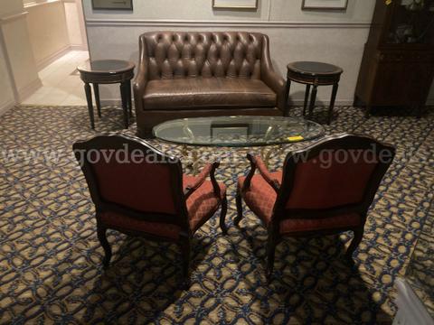 Lot of 2 padded chairs, leather sofa, 2 round end tables, glass oval table