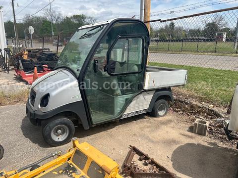Silver club car with broken frame rail