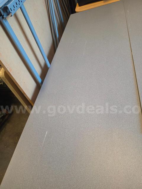 ONE LONG GREY DESK