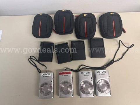 4 - CANON CAMERAS - POWERSHOT 180 W/CASES AND CHARGERS